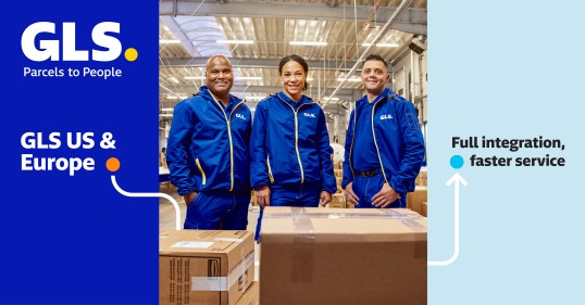 Three GLS employees in blue uniforms smiling in a logistics warehouse, surrounded by parcels. The visual highlights the integration of GLS US and European networks for faster and optimized service.