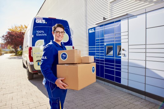 Woman delivering to parcel locker